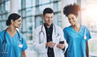 © ClearConcept/peopleimages.com - Collaboration, healthcare or phone with doctor and nurses in hospital together for communication. Medical, social media and smile with medicine professional talking to staff in clinic for networking