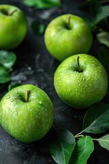 Wall Mural - A group of green apples sit on a table, awaiting use or display