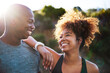 © peopleimages.com - Happy, black couple and fitness with partner in nature for exercise, outdoor training or workout together. African man or woman with smile in sunshine for running, cardio or marathon on mountain road