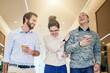 © Sanc/peopleimages.com - Business people, happy and coffee break in office with laughing for comedy joke, collaboration and relax together. Employees, men and woman with latte drinks, funny conversation and gossip story
