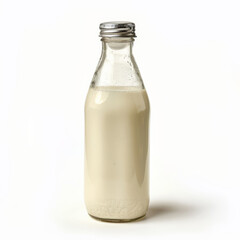 Wall Mural - A glass bottle of fresh milk with a metal cap, condensation on the outside, isolated on white background