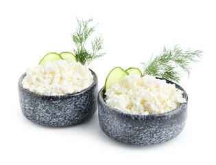 Wall Mural - Bowls of tasty cottage cheese on white background