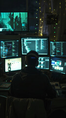 Aufkleber - Rear View of Hacker Working Late at Night in Front of Multiple Computer Screens