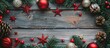 © Ilgun - Festive Christmas ornament border surrounding copy space image on wooden backdrop.