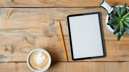 Poster - A white tablet sits on a wooden table next to a cup of coffee and a pencil. The scene suggests a moment of relaxation or contemplation