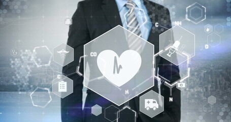 Image of medical icons and chemical formula with data processing over businessman