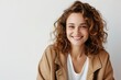 © Tuyres - Smiling Woman with Curly Hair in Casual Outfit. Generative AI.