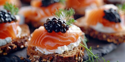 Wall Mural - A plate of salmon with blackberries and dill. The salmon is served on a piece of bread with a blackberry and dill garnish