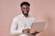© N7 - Smiling Black Male Manager with Laptop