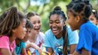 © InfiniteFlow - Laughing kids playing with female counselor at summer camp AIG535