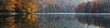 © Da - Reflection on the lake surface: The calm lake surface reflects an autumn scenery. The lake water is crystal clear and the reflection is clearly visible. Natural seasonal changes, generated by AI, high