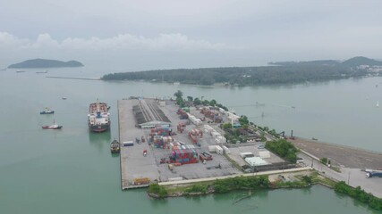 Wall Mural - Aerial view of container cargo ship in the export and import business and logistics international goods in urban city. Shipping to the harbour by crane in Bangkok harbour, Thailand.