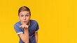 © Prostock-studio - Affection feelings. Cute lovely caucasian boy sending blow kiss with pout lips at camera, orange studio background