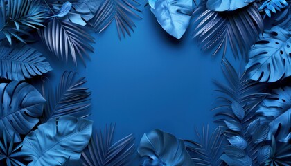 Collection of tropical leaves foliage plant in blue color with clear center space background