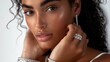 © Nicat - A stunning model showcases a white gold diamond ring and tennis bracelets.