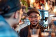 © siripimon2525 - 16. Portrait of a diverse barista explaining the coffee menu to a customer, high detail, photorealistic, engaging atmosphere, studio lighting