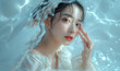 © NOS Inc. - 水で潤う女性