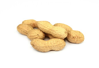 Wall Mural - Organic peanuts in shell, isolated on white background. Raw peanuts on a white background. Unshelled peanuts.