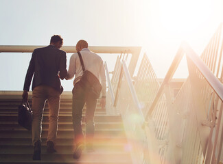 business, men and walking on stairs outdoor for commute to work with communication, flare and friend