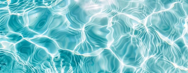 light blue water in swimming pool with ripples and reflections, top view. summer background banner concept for vacation, relaxation or travel theme. close up, detailed, natural light