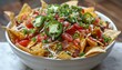 © LimeSky - Spicy nacho bowl with jalapeño peppers as a snack