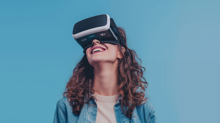 Wall Mural - Woman with VR headset smiling on plain background 