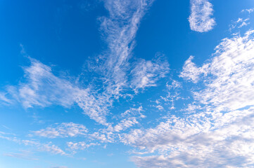 Wall Mural - Blue sky and white fluffy tiny clouds background and pattern