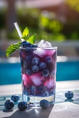 Wall Mural - Capture the essence of a Tito's Blueberry Vodka Cocktail 2 ounces Tito's Handmade Vodka1/2 cup fresh blueberries1 ounce lemon juice1 ounce simple syrupIceClub sodaMint sprig and extra blueberries for 