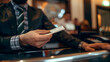 © peerapong - client walks into the bank,greeted by the cool,air-conditioned lobby and the friendly smiles the staff.Holding check in hand, they approach the counter where courteous bank teller is ready to assist..