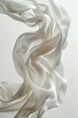 Poster - Close-up of a piece of elegant silk fabric gently fluttering in the breeze, set against a pure white background,