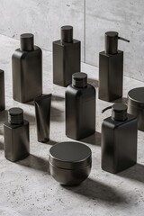 Wall Mural - Minimalist black cosmetic containers on concrete surface