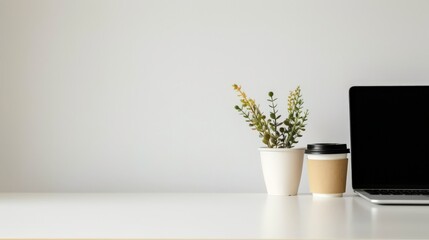 Aufkleber - Minimalist office desk setup with potted plant, coffee cup, and laptop against a clean white background. Concept of simplicity and productivity