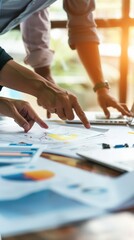 Poster - Hands of professionals pointing at data charts during a business meeting. Strategy planning and teamwork in a modern office setting. Ideal for corporate growth and financial analysis