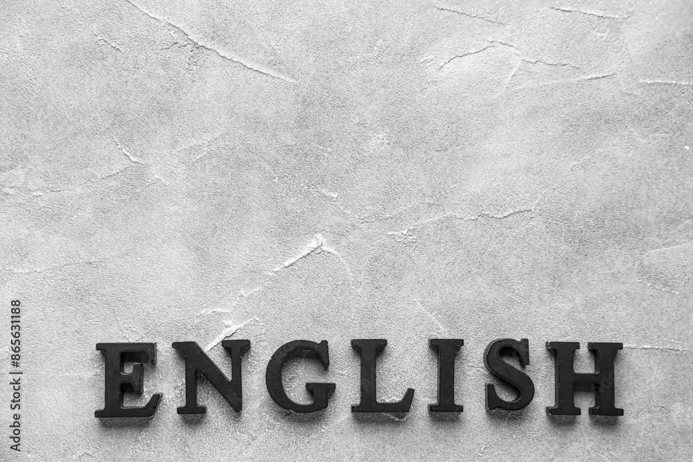 Word ENGLISH on grunge grey background