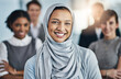 © peopleimages.com - Leadership, diversity and portrait of Muslim woman with team, confidence or solidarity at global consultancy. About us, happy female manager and business people in office with smile, trust or support