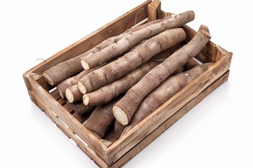 Canvas Print - Cassava roots in crate white background top view