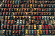 © SANA - An ultra-realistic aerial view of a scrap yard with meticulously arranged rows of old cars at Fremantle Port, Perth, Australia