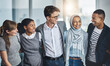 © peopleimages.com - Team, diversity and business people embrace with smile, confidence and solidarity at global consultancy. About us, happy men and women in office for professional collaboration, equality and support