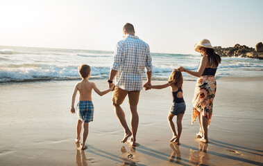 Poster - Family, back view and holding hands with children on beach for walk, summer holiday or bonding together in nature. Mother, father and young kids strolling on ocean coast, outdoor vacation or weekend