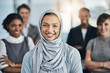© peopleimages.com - Management, smile and portrait of Muslim woman with team, confidence or solidarity at global consultancy. About us, happy female leader and business people in office for diversity, equality or trust