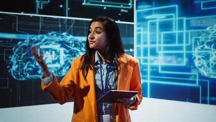 Poster - Public speaker doing presentation at tech forum event, explore ways emerging AI technologies can positively enhance companies workforce. Indian woman promoting artificial intelligence solutions