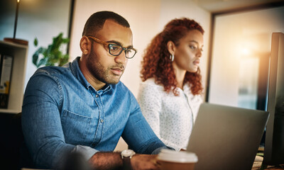 Poster - Business people, night and collaboration with laptop, research for article, teamwork and internet in modern office. Employees, consultant or journalist with pc, editing and copywriting with deadline