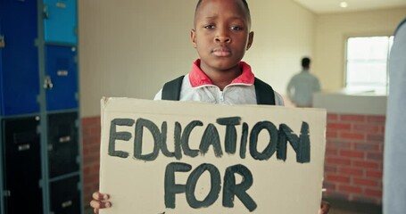 Wall Mural - School, education and face of boy with placard, signboard and protest for awareness with dialogue. Campus, corridor or hallway with teenager student, holding board and banner for human rights