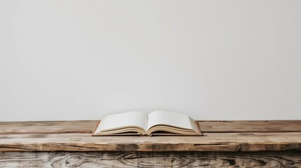 Poster - Book on wooden table with white wall background Education concept poster with copy space