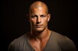 © Stocknterias - Portrait of a handsome man. Studio shot over black background.