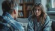 © rookielion - Social worker talking to a domestic violence survivor in a shelter