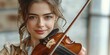 © ckybe - Gorgeous, alluring young lady playing violin in a white studio, emitting a gentle and enchanting melody. Illustrates the idea of live musical display using a vintage approach