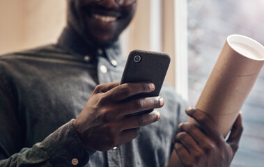 Leinwandbilder - Black man, hands and phone with blueprint in office for floor plan, research and communication. Employee, smile and contractor with tech at work for architecture news, feedback and update to client