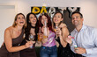 © PintoArt - Friends Celebrating at a Party with Drinks and Balloons