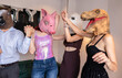 © PintoArt - Friends Dancing in Animal Masks at a Party